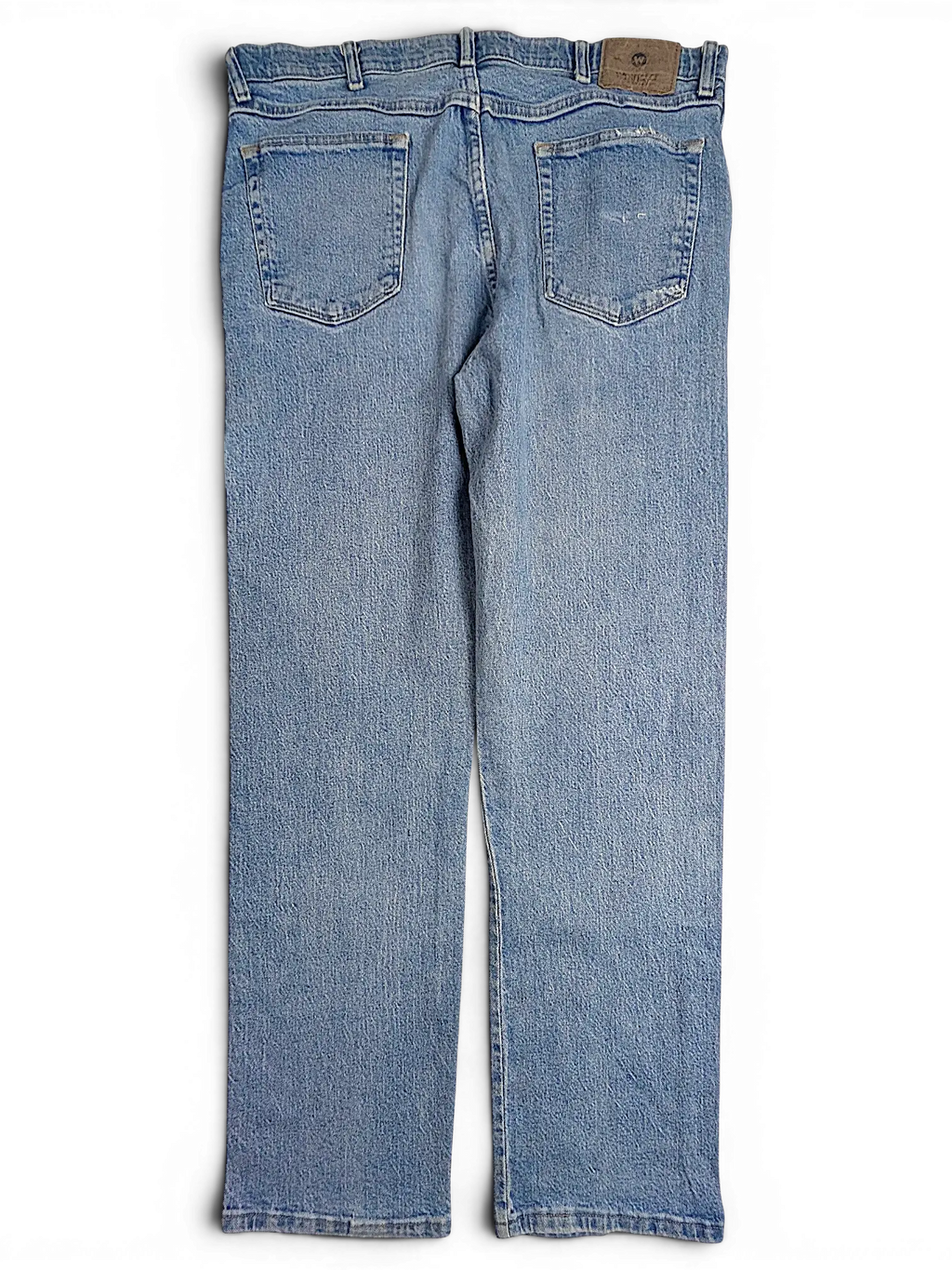 JAKE & IPI Wrangler regular fit light wash blue denim jeans, back view with patch pockets and leather brand label.