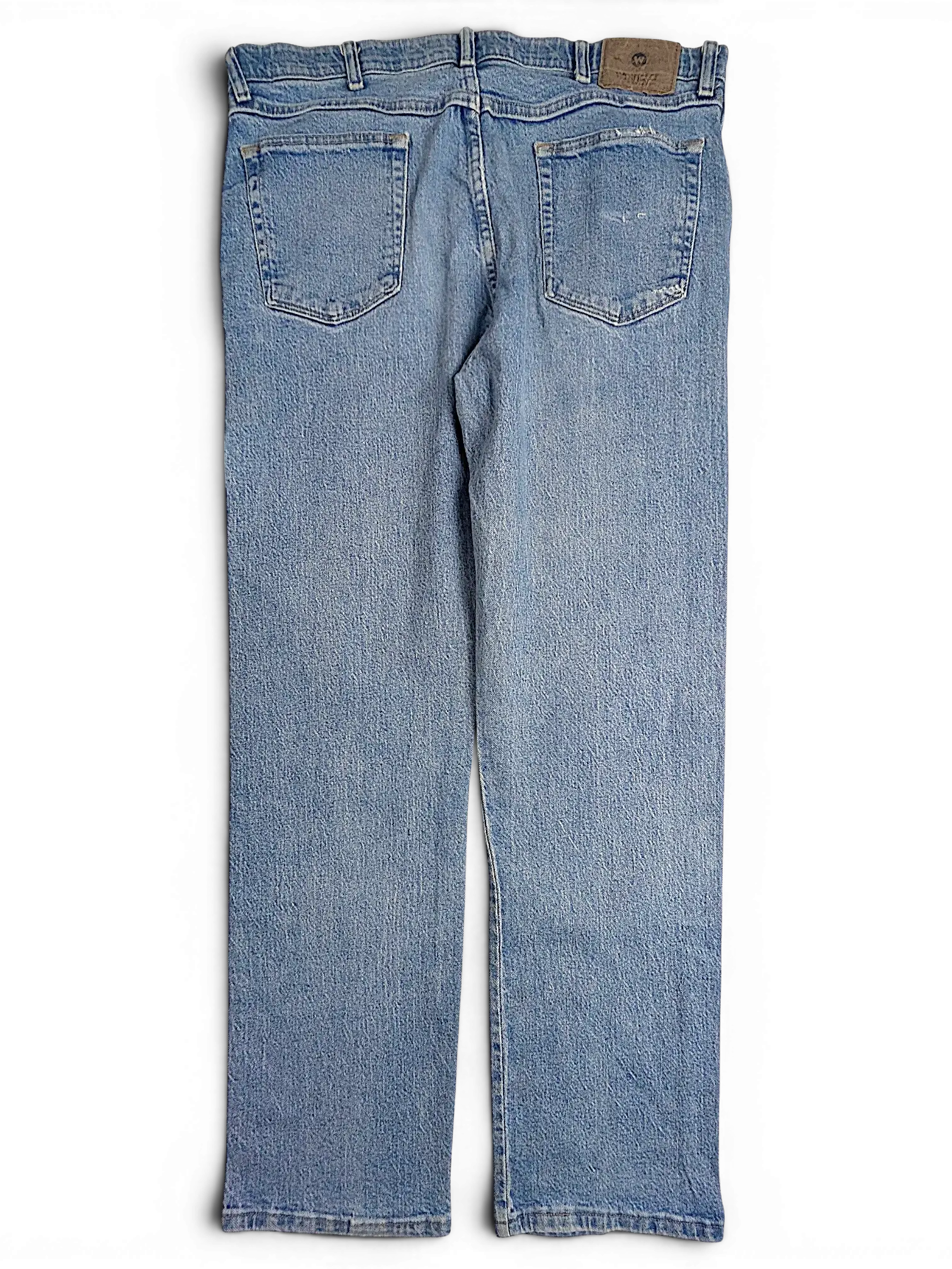 JAKE & IPI Wrangler regular fit light wash blue denim jeans, back view with patch pockets and leather brand label.