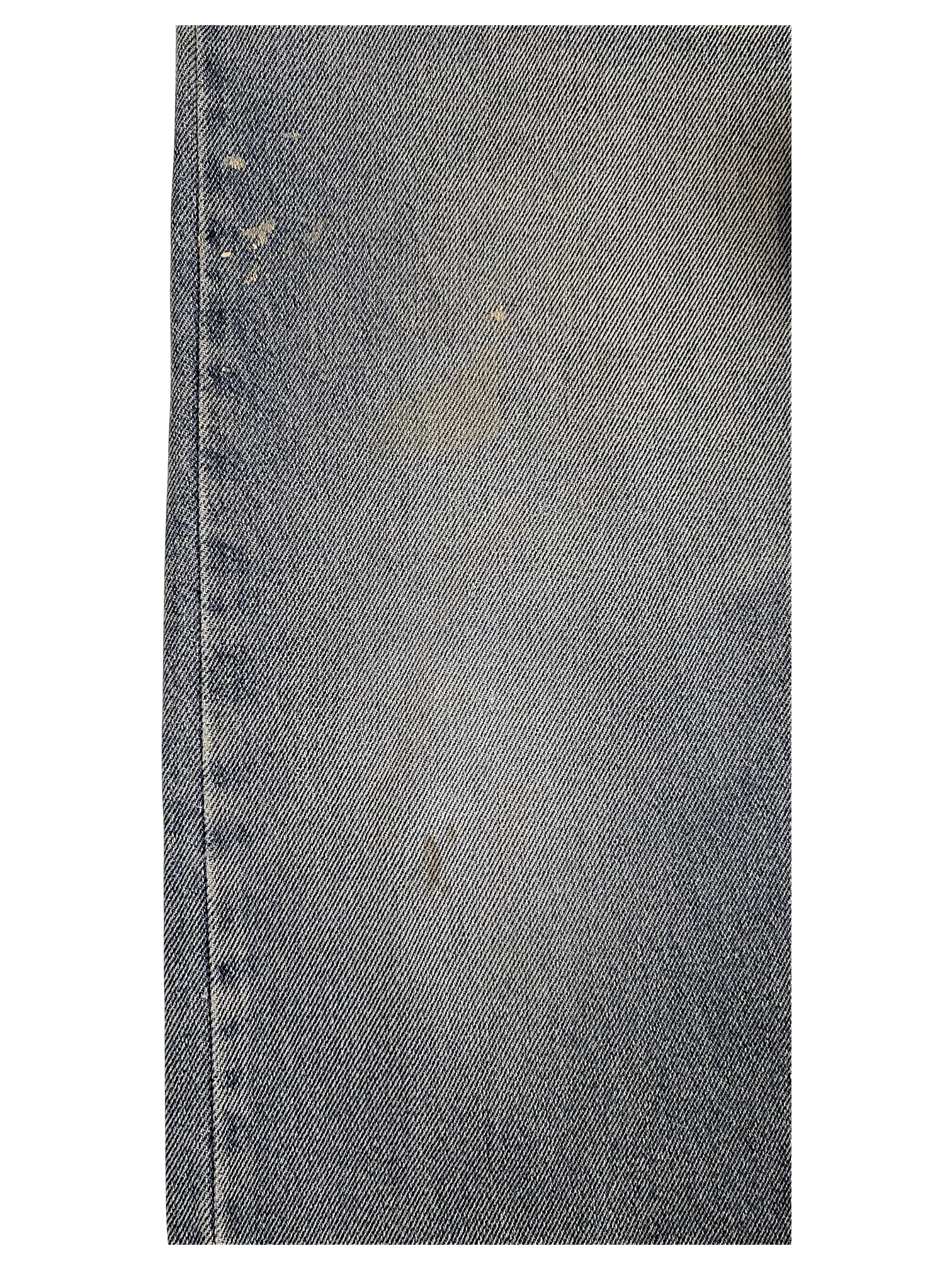 JAKE & IPI Wrangler relaxed fit light wash denim jeans featuring subtle distressed spots and natural wear