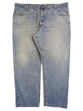 JAKE & IPI Wrangler relaxed fit light wash blue denim jeans with a classic five-pocket design.