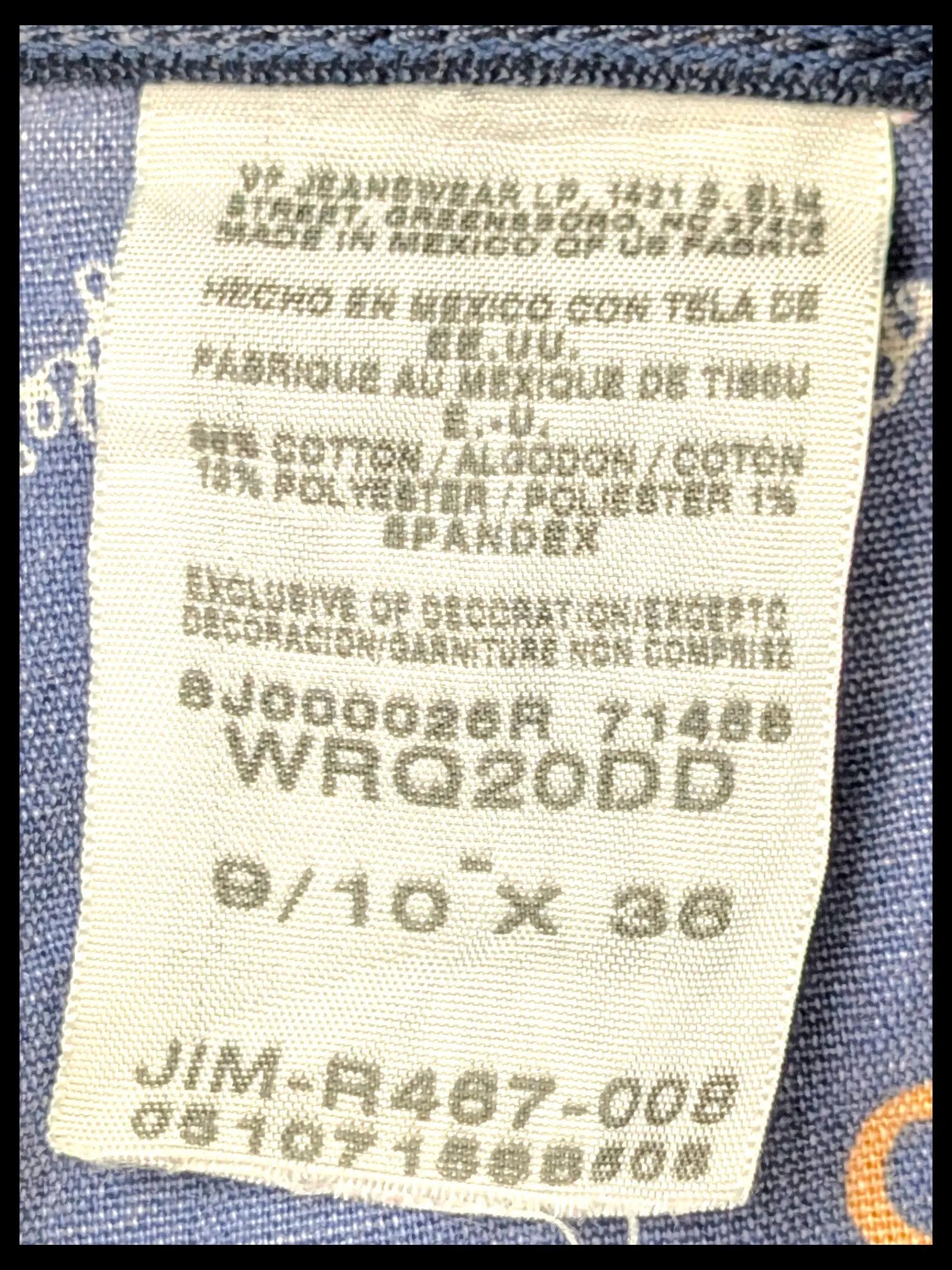 JAKE & IPI Wrangler Q-BABY jeans interior care label showing size 9/10 x 36 and cotton blend fabric composition