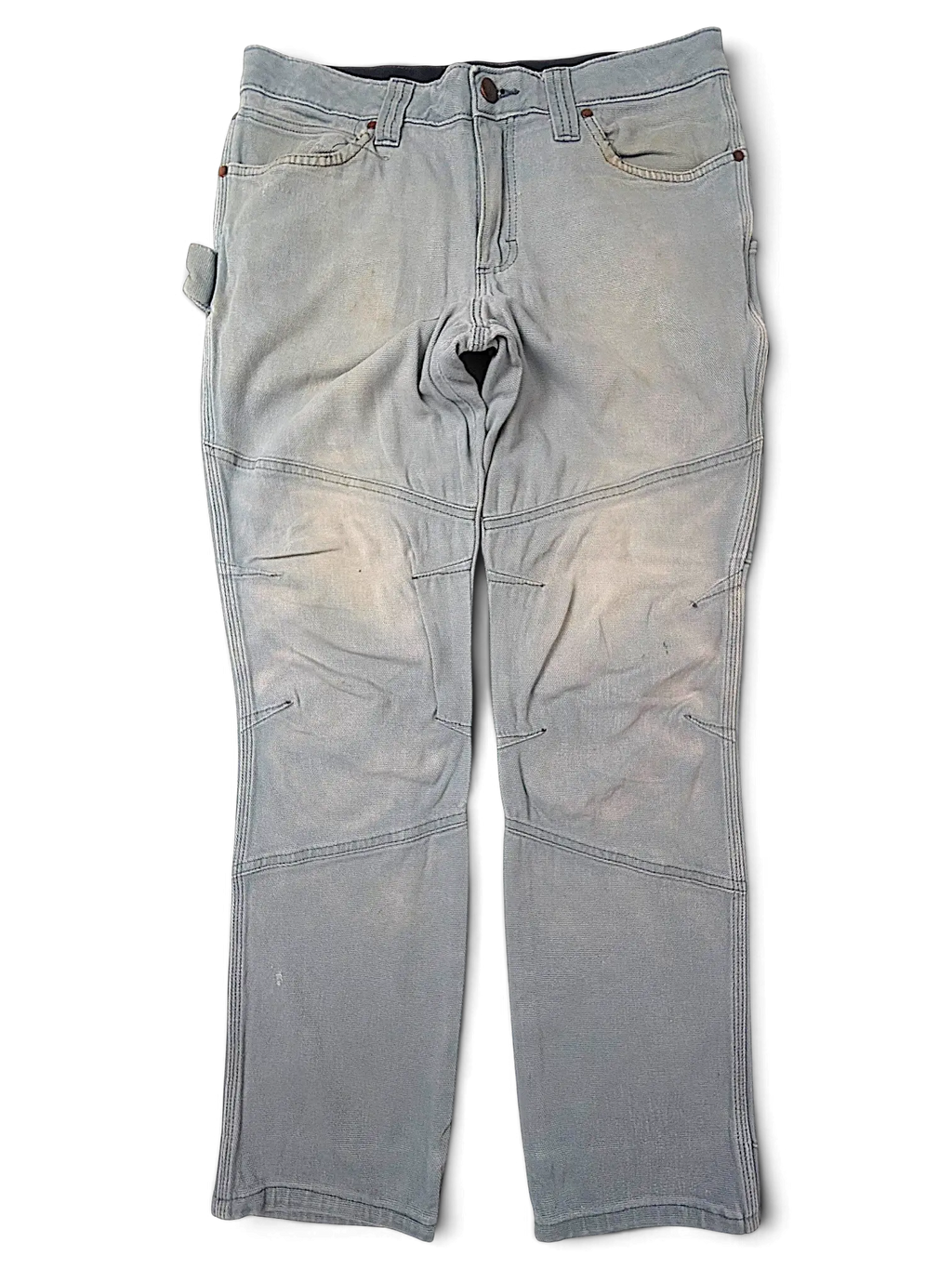 JAKE & IPI Wrangler Riggs Workwear pants in faded grey canvas with reinforced knees and utility pockets.