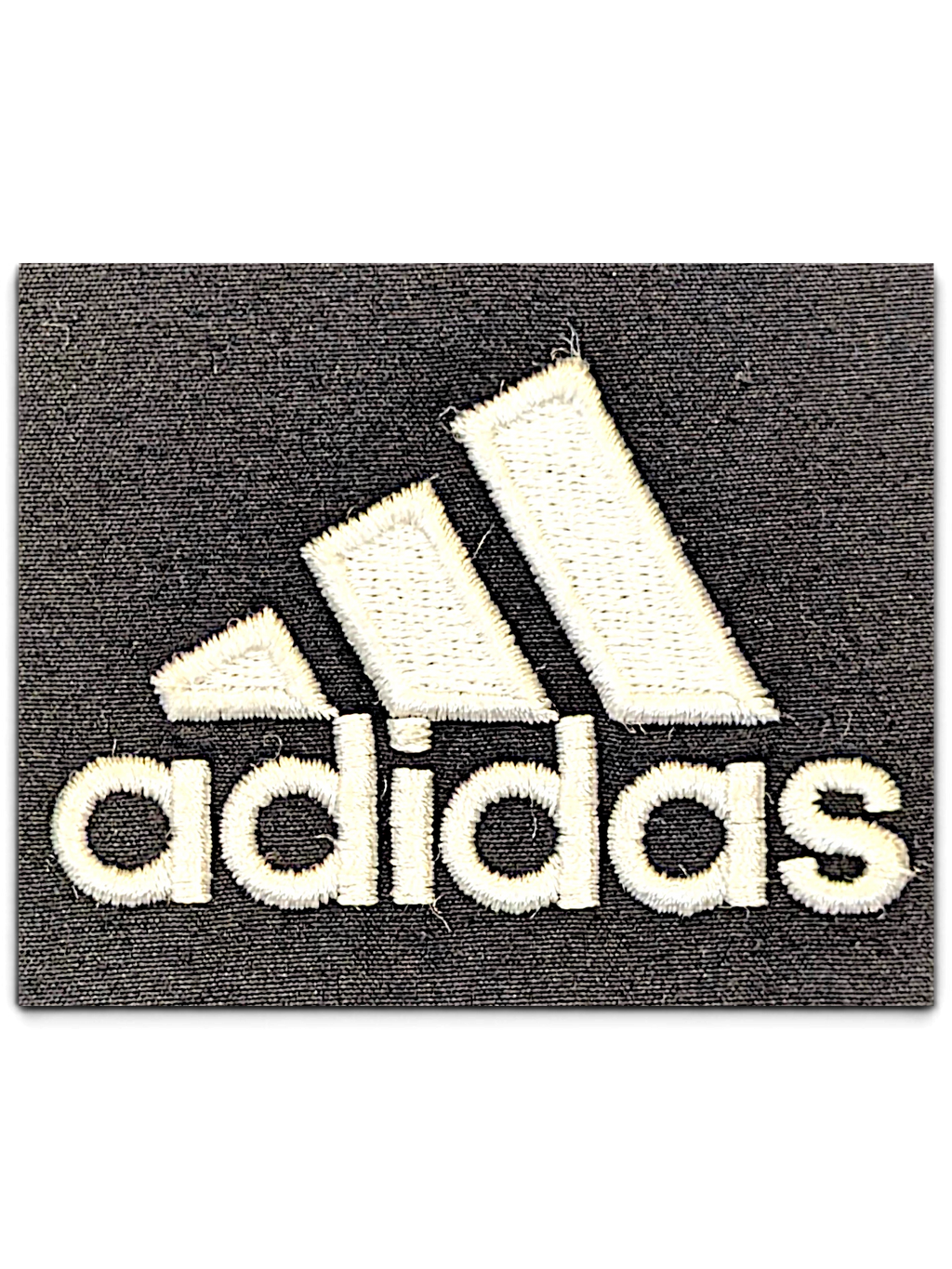 JAKE & IPI pre-owned adidas logo embroidered in white thread on a dark grey fabric background