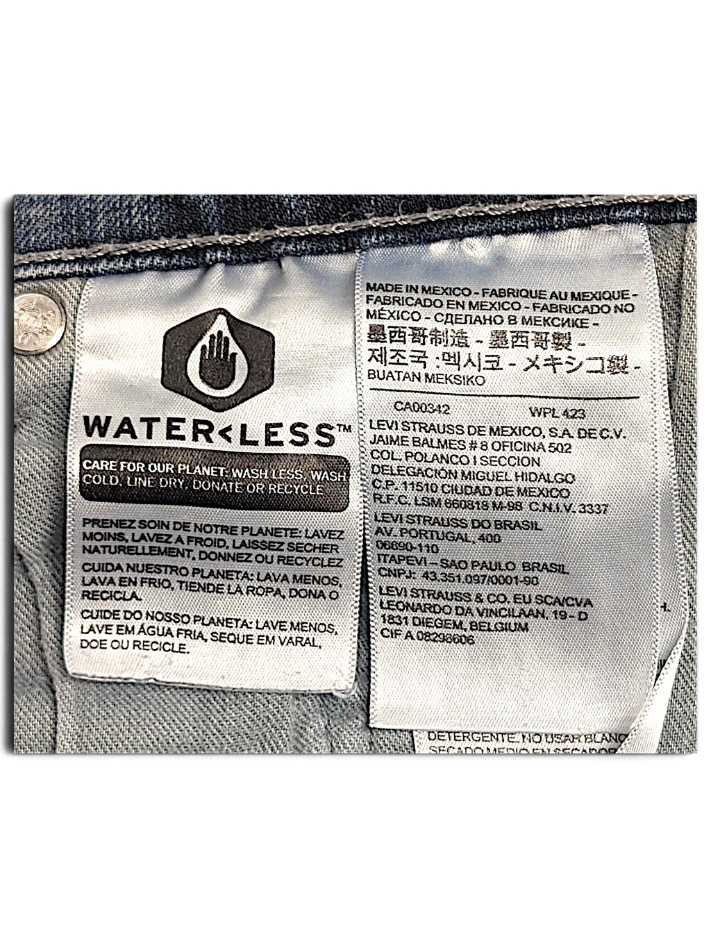 JAKE & IPI Levi’s 505 WaterLess jeans interior care label and origin tag in faded blue denim