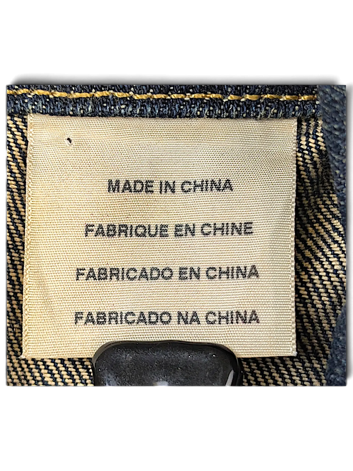 JAKE & IPI Levi's denim vest interior garment label showing manufacturing origin in China
