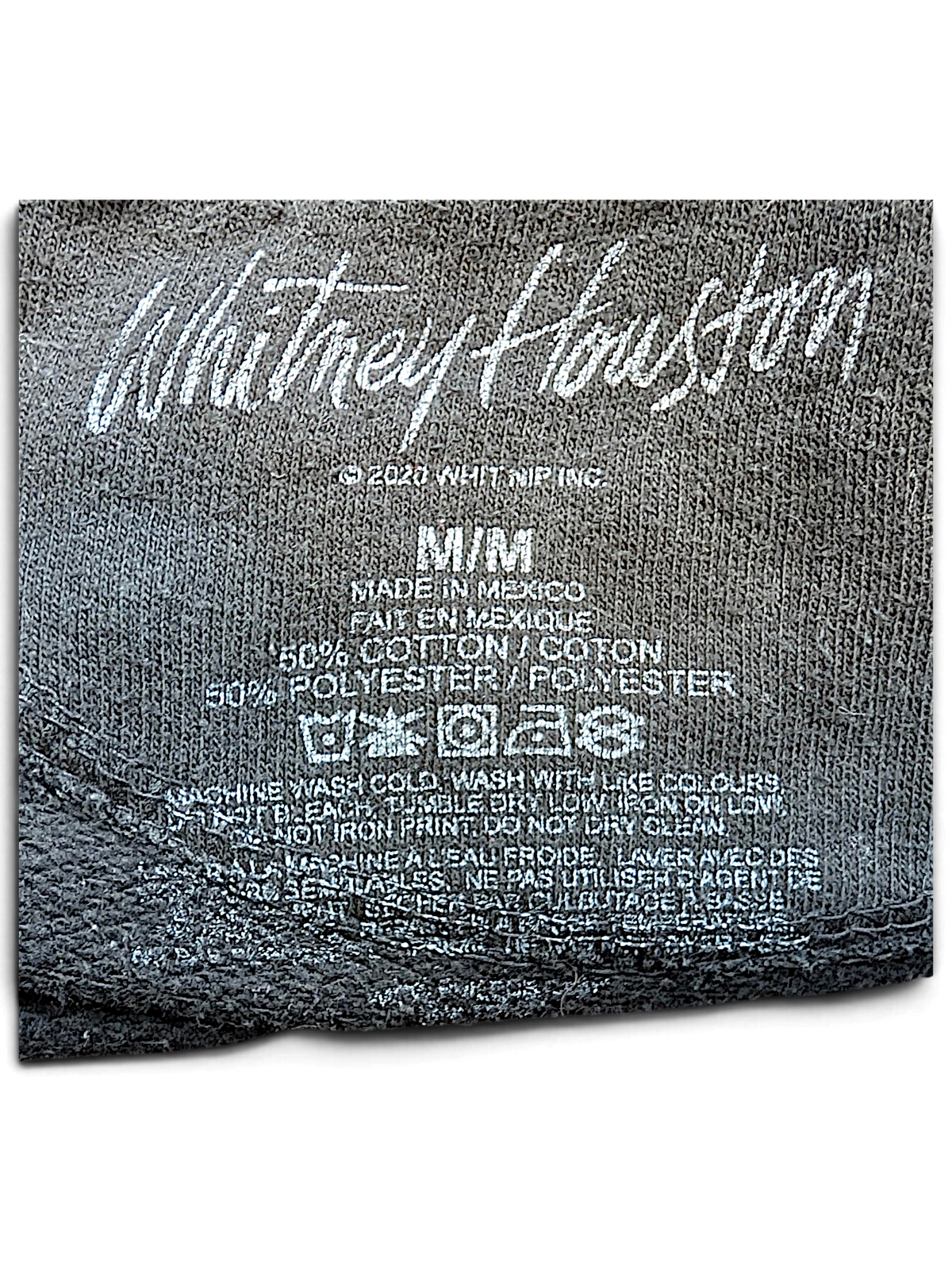 JAKE & IPI Whitney Houston black hoodie interior label with fabric composition and care instructions