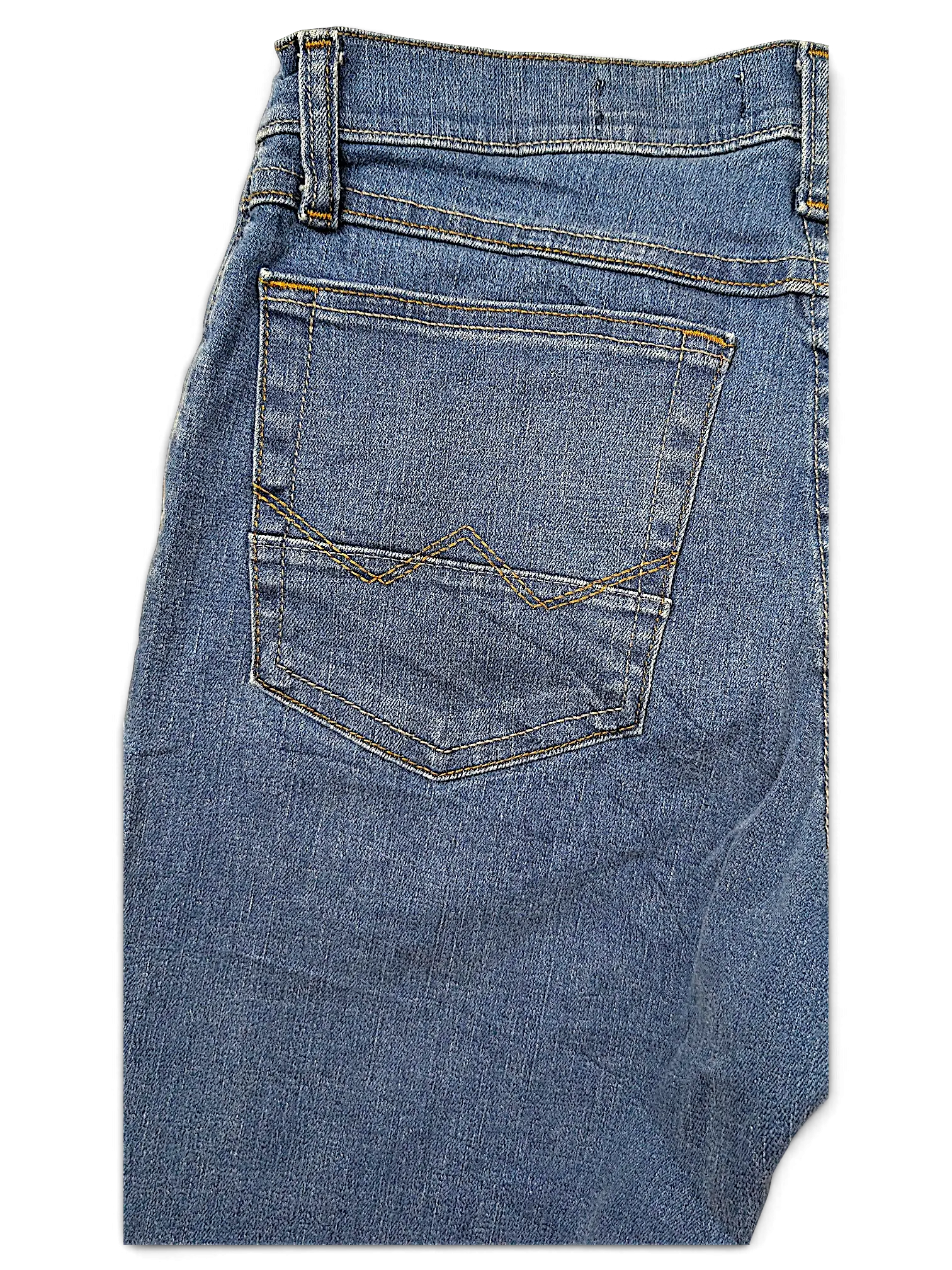 JAKE & IPI Wrangler straight fit blue denim jeans featuring a back pocket with signature stitching detail.