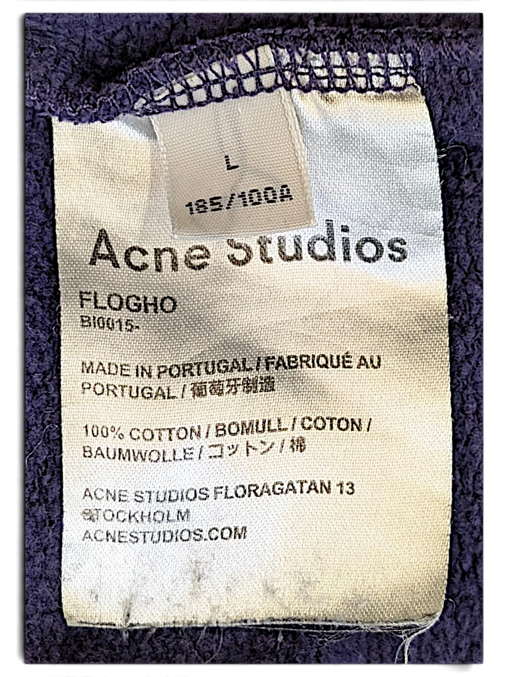 JAKE & IPI Acne Studios purple sweatshirt interior care label showing size L, 100% cotton, and made in Portugal details.