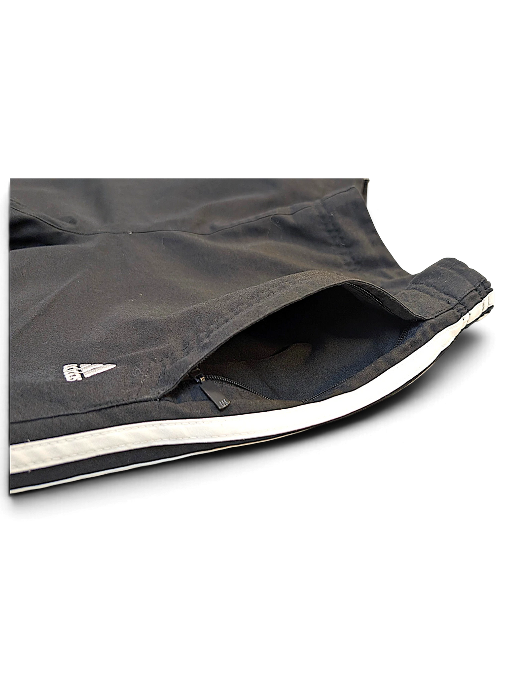 JAKE & IPI pre-owned adidas black track pants with white 3-stripes and a zippered side pocket detail