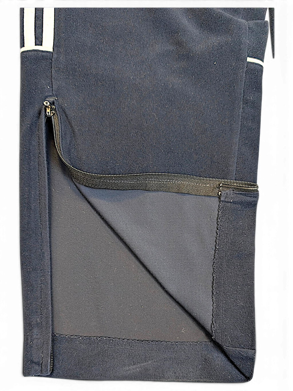JAKE & IPI adidas blue velour track pants featuring a zippered leg opening and soft texture