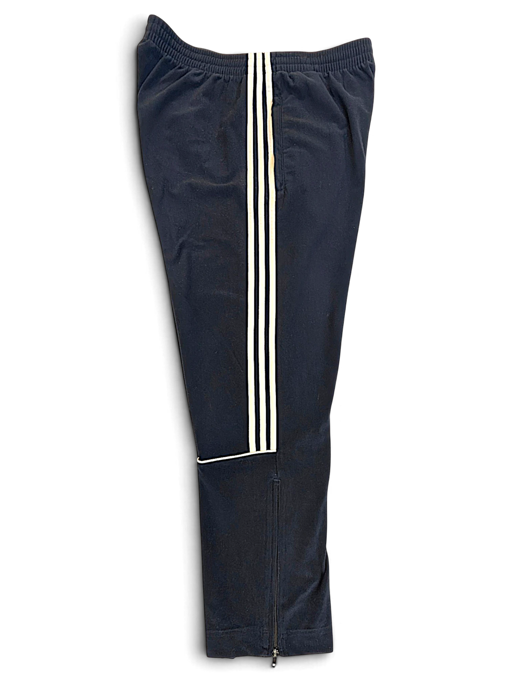 JAKE & IPI pre-owned blue adidas velour track pants with signature white side stripes and zippered leg openings.