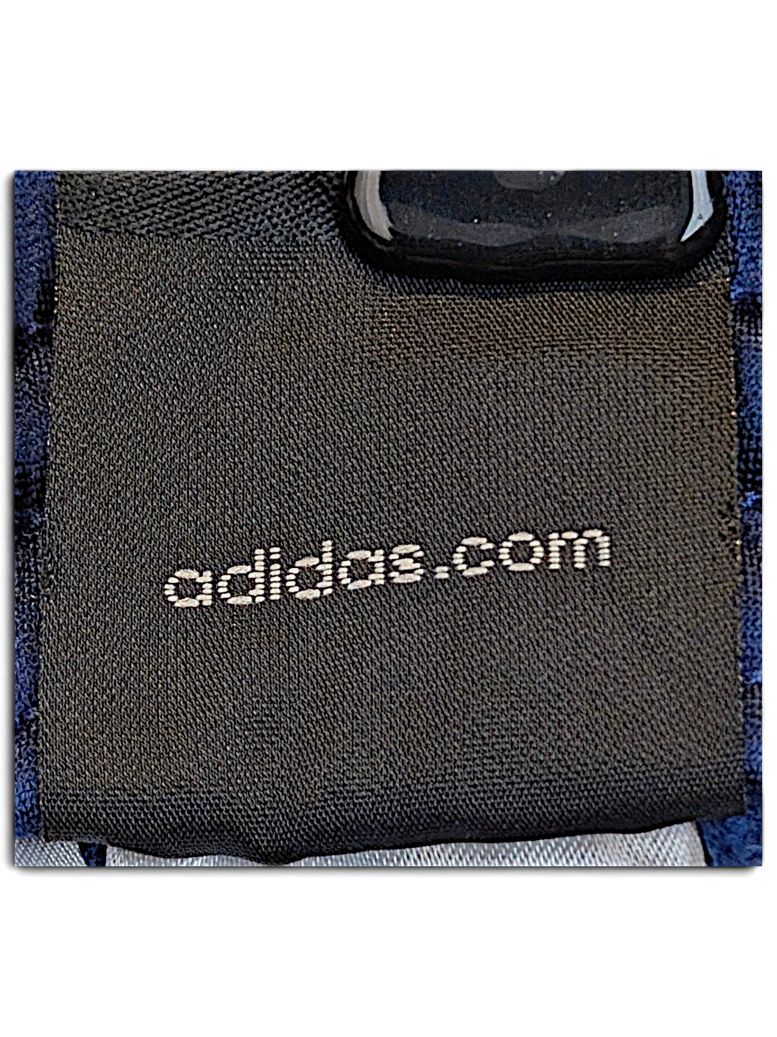JAKE & IPI adidas brand label on navy and light blue track pants