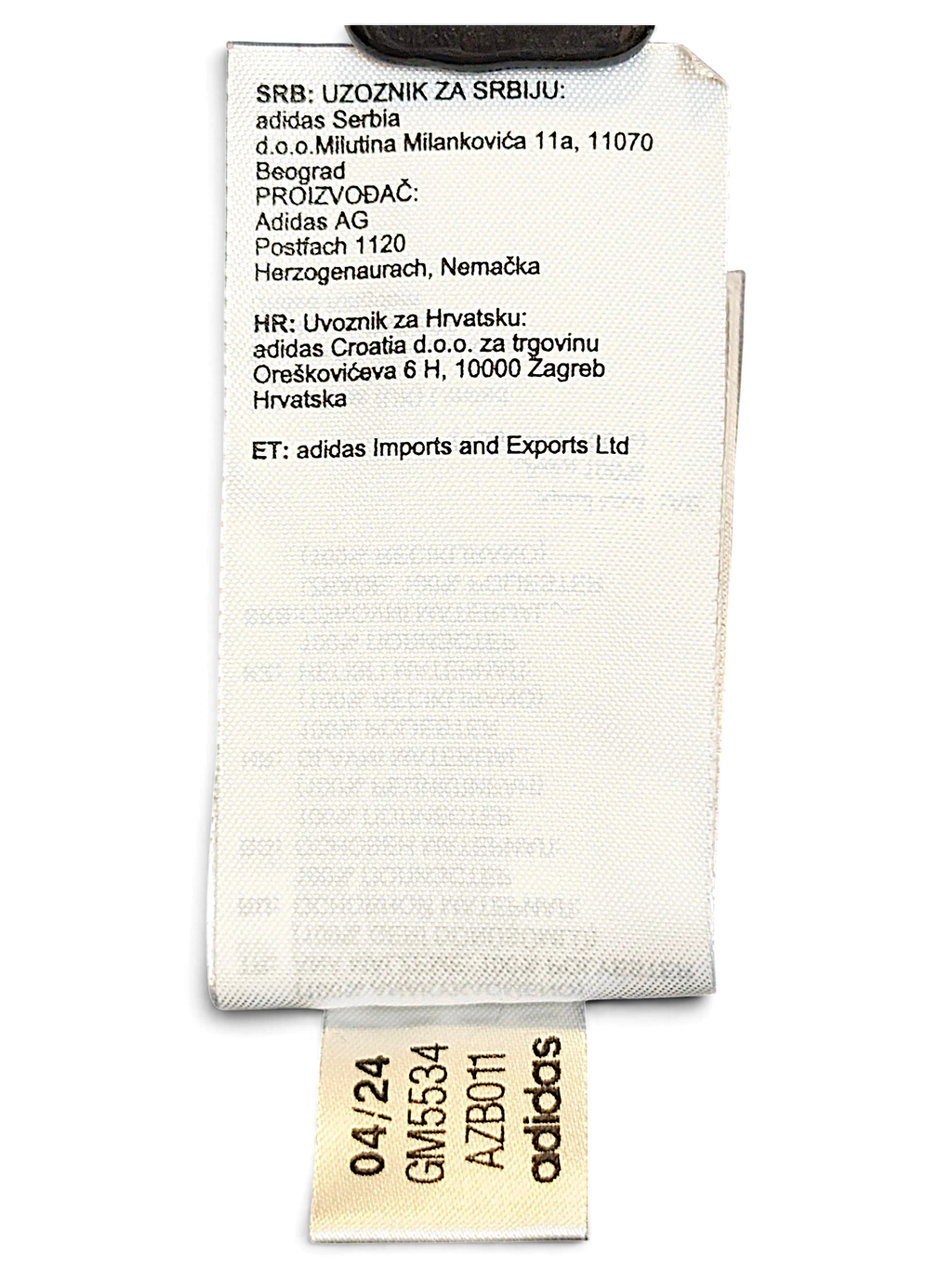 JAKE & IPI adidas track pants garment care and origin label with product code and manufacturing details