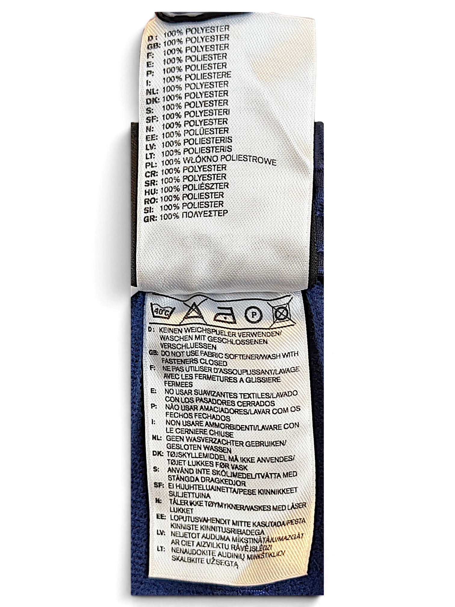 JAKE & IPI adidas track pants care and composition label showing 100 percent polyester material details