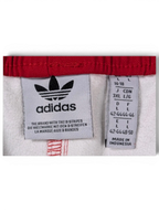JAKE & IPI Adidas red leather pants interior label with size and branding details