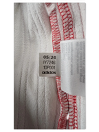 JAKE & IPI Adidas red leather pants interior care label with production date 05/24 and model code IY7246