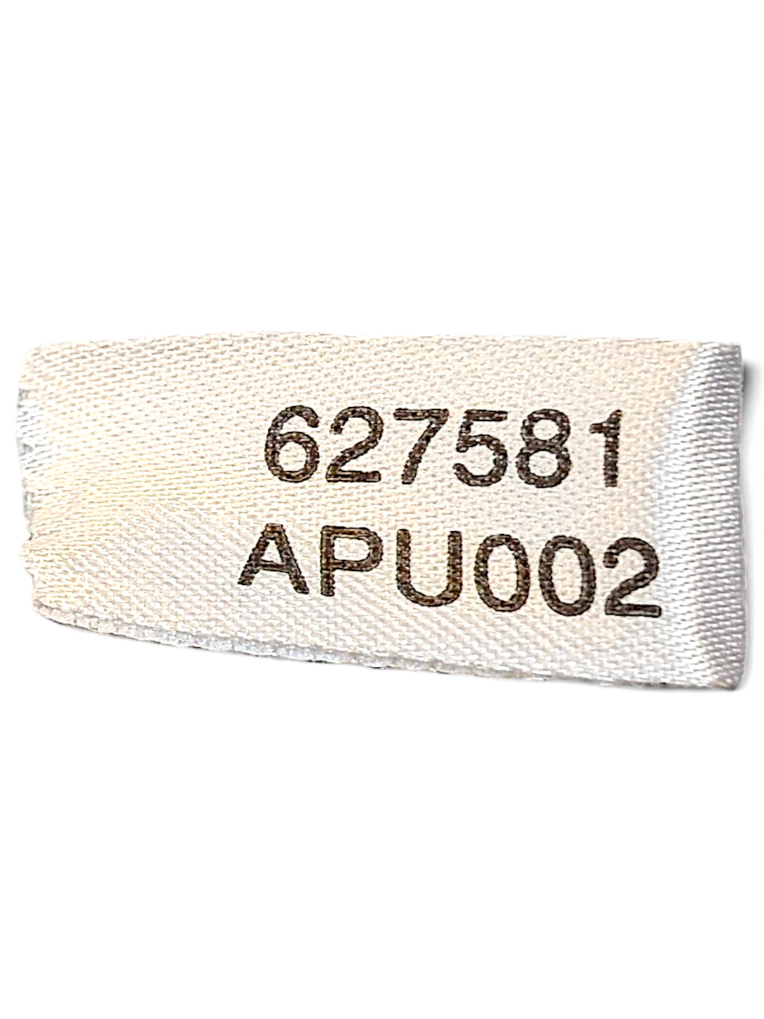 JAKE & IPI adidas track pants interior garment label showing style code 627581 and APU002