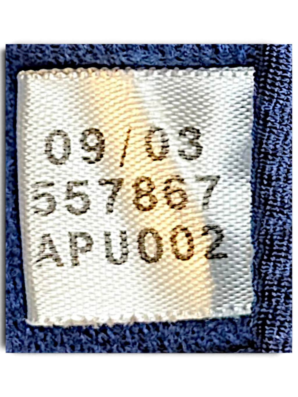 JAKE & IPI adidas track pants interior care label showing production date 09/03 and style code 557867