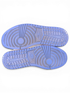 JAKE & IPI Air Jordan 1 Retro High Hyper Royal sneakers showing the blue rubber outsoles with traction patterns