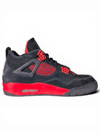 JAKE & IPI Air Jordan 4 Red Thunder sneakers in black and red suede with visible wear on a black background.