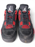 JAKE & IPI Air Jordan 4 Red Thunder sneakers in black nubuck with vibrant red accents and Jumpman tongue branding.