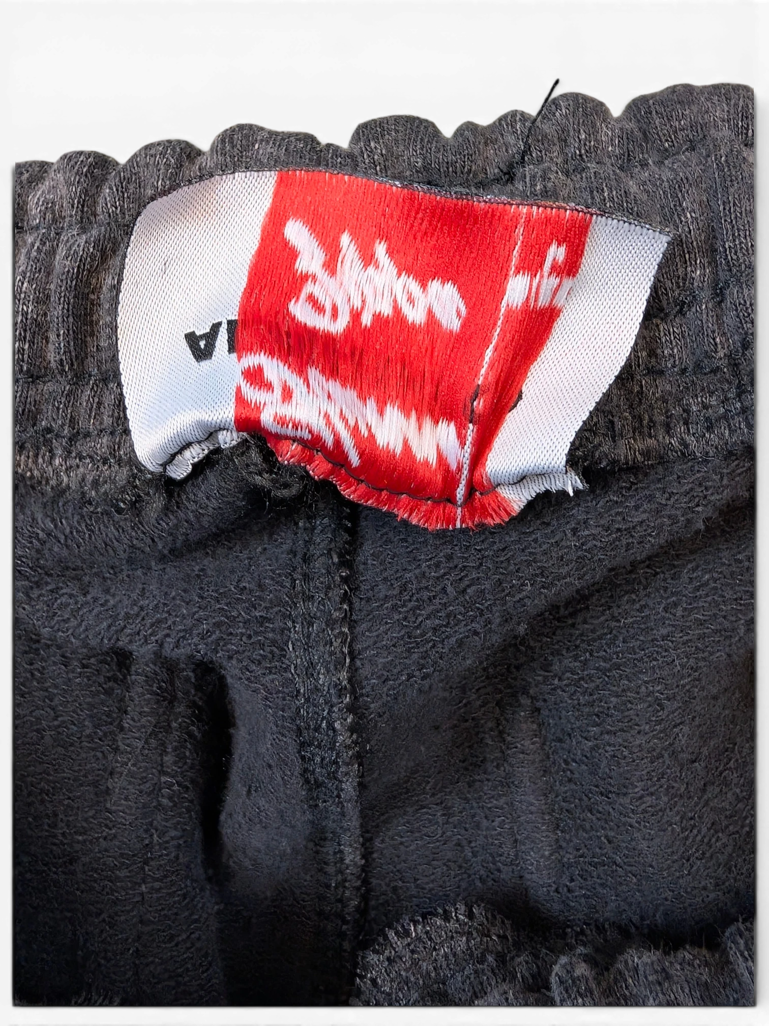 JAKE & IPI Alarikco track suit black fleece sweatpants interior label detail