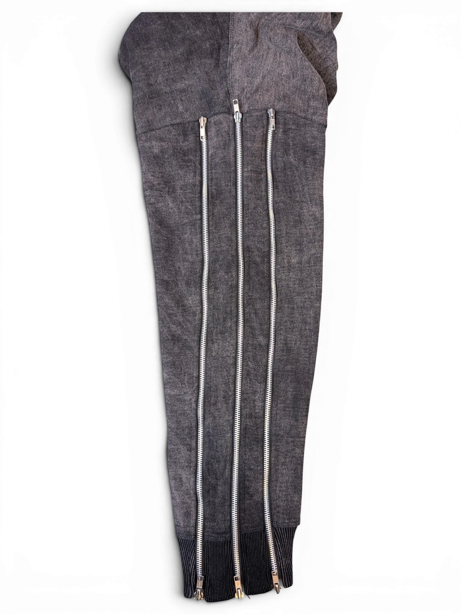 JAKE & IPI Alarikco track suit pants in charcoal grey with three vertical silver zippers and ribbed cuffs.