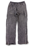 JAKE & IPI Alarikco track suit pants in charcoal grey with full-length side zippers on a black background