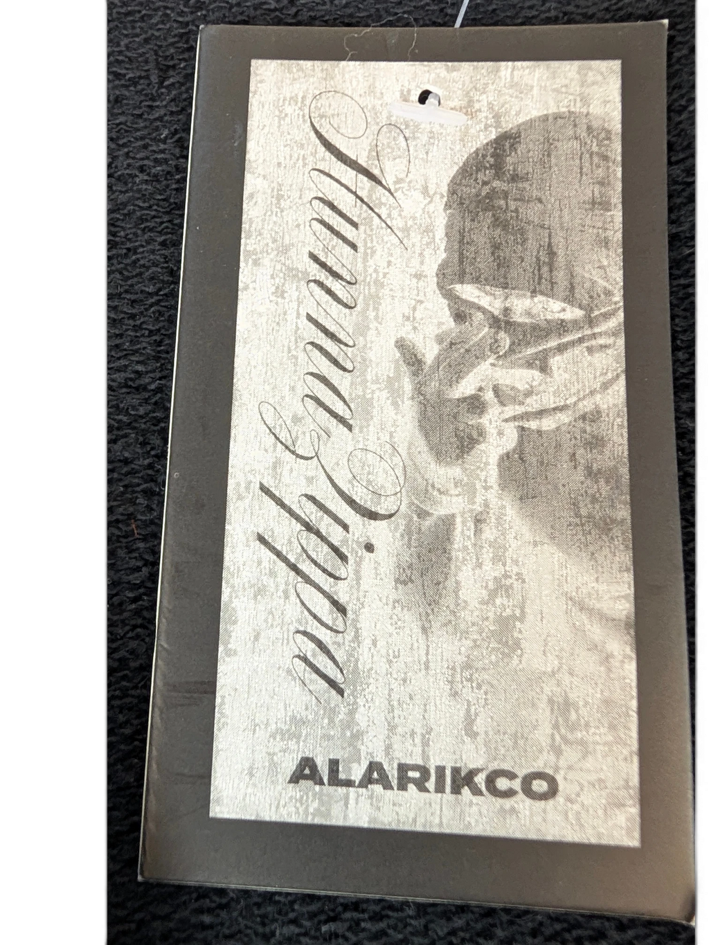 JAKE & IPI Alarikco track suit clothing brand tag with distressed grey graphic design and elegant script text