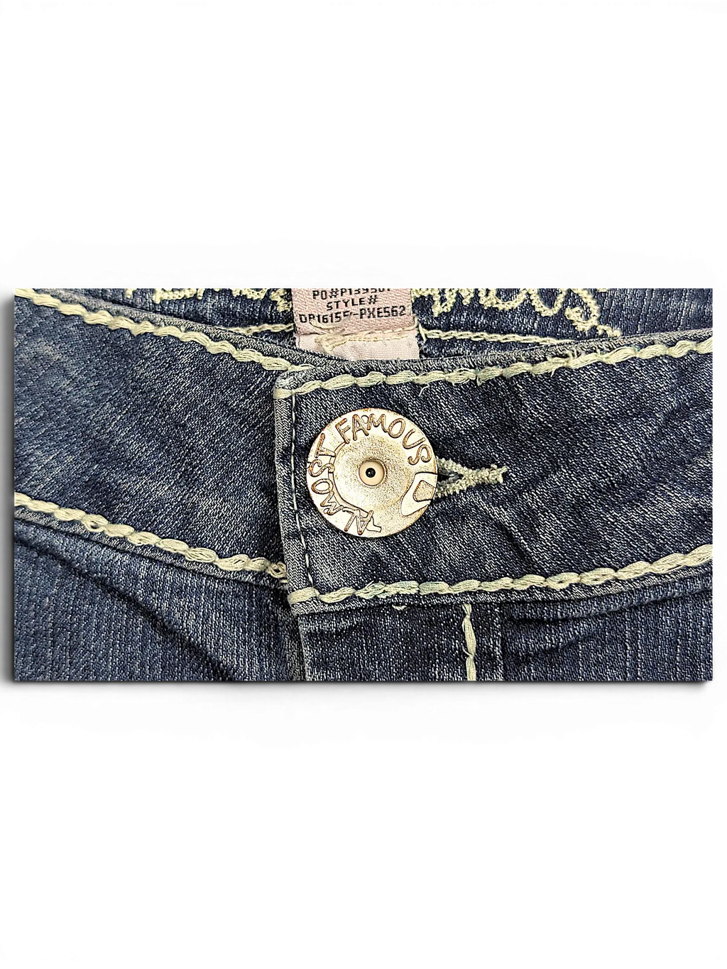 JAKE & IPI Almost Famous blue denim jeans featuring a branded metal button and light contrast stitching