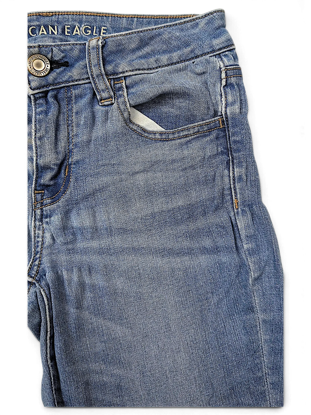 JAKE & IPI American Eagle Outfitters light wash blue denim jeans with a button closure and front pocket detail.