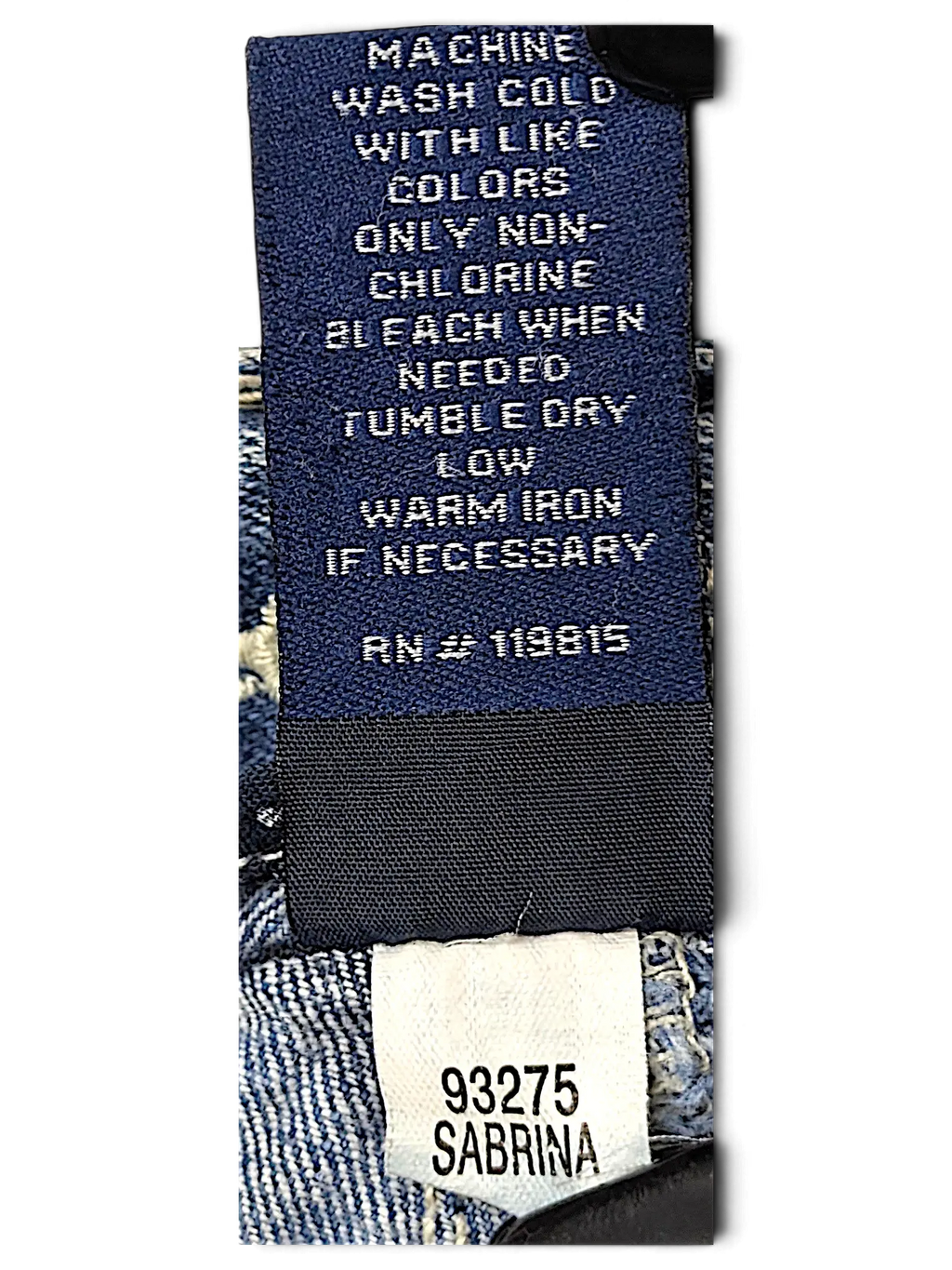 JAKE & IPI Amethyst Y2K jeans care label with Sabrina style tag and blue denim fabric background