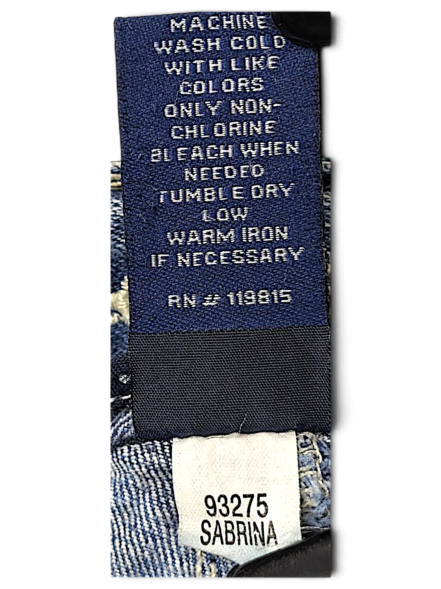 JAKE & IPI Amethyst Y2K jeans care label with Sabrina style tag and blue denim fabric background