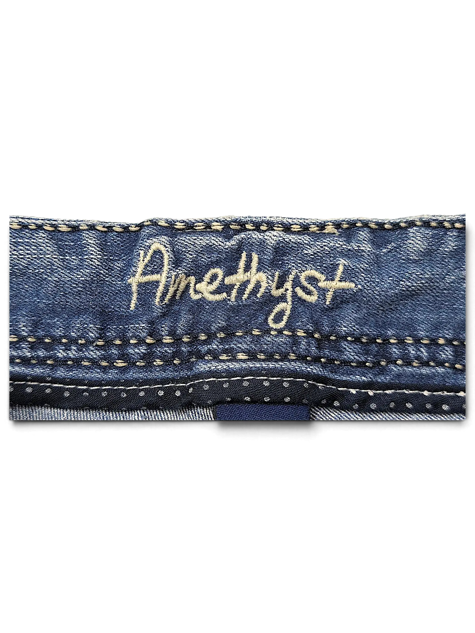 JAKE & IPI Amethyst Y2K jeans featuring blue denim fabric with embroidered brand logo on the waistband