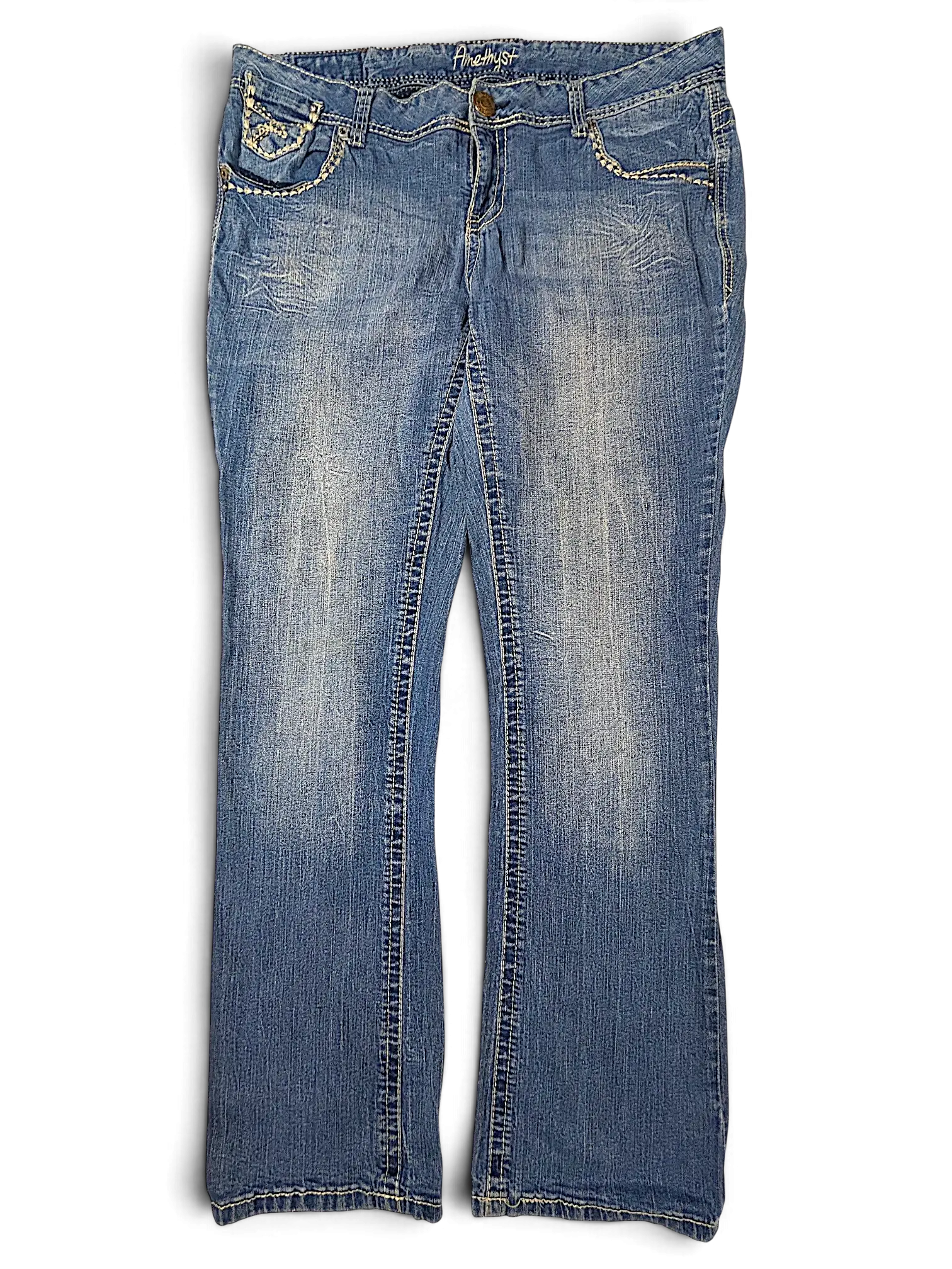 JAKE & IPI Amethyst Y2K blue denim jeans with decorative stitching and whiskering details on the front pockets.
