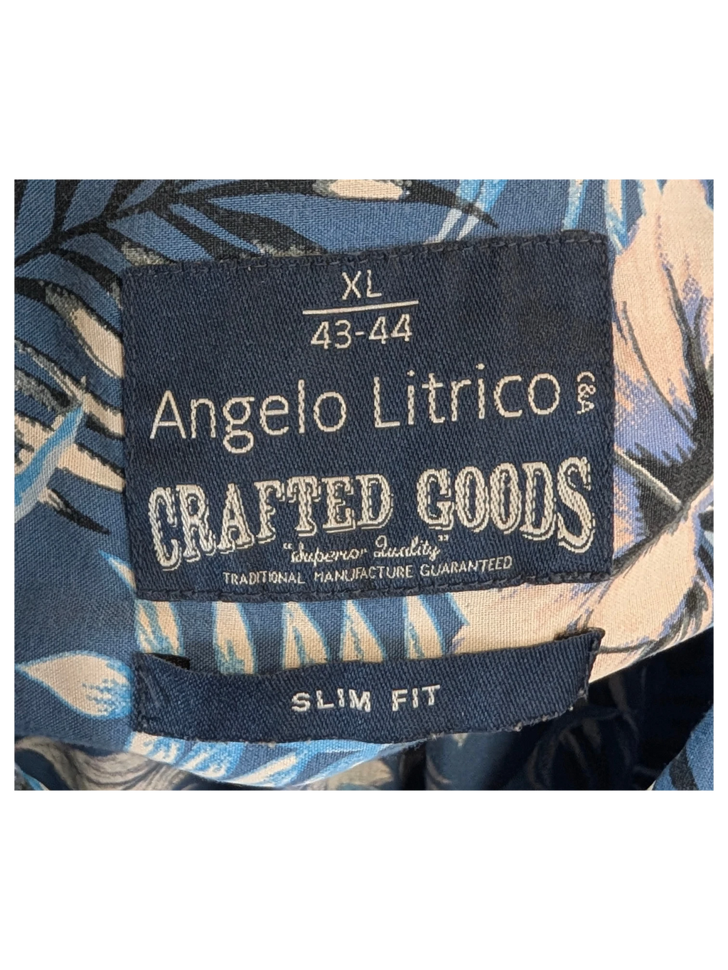 JAKE & IPI Angelo Litrico slim fit Hawaiian shirt label in blue with floral print background