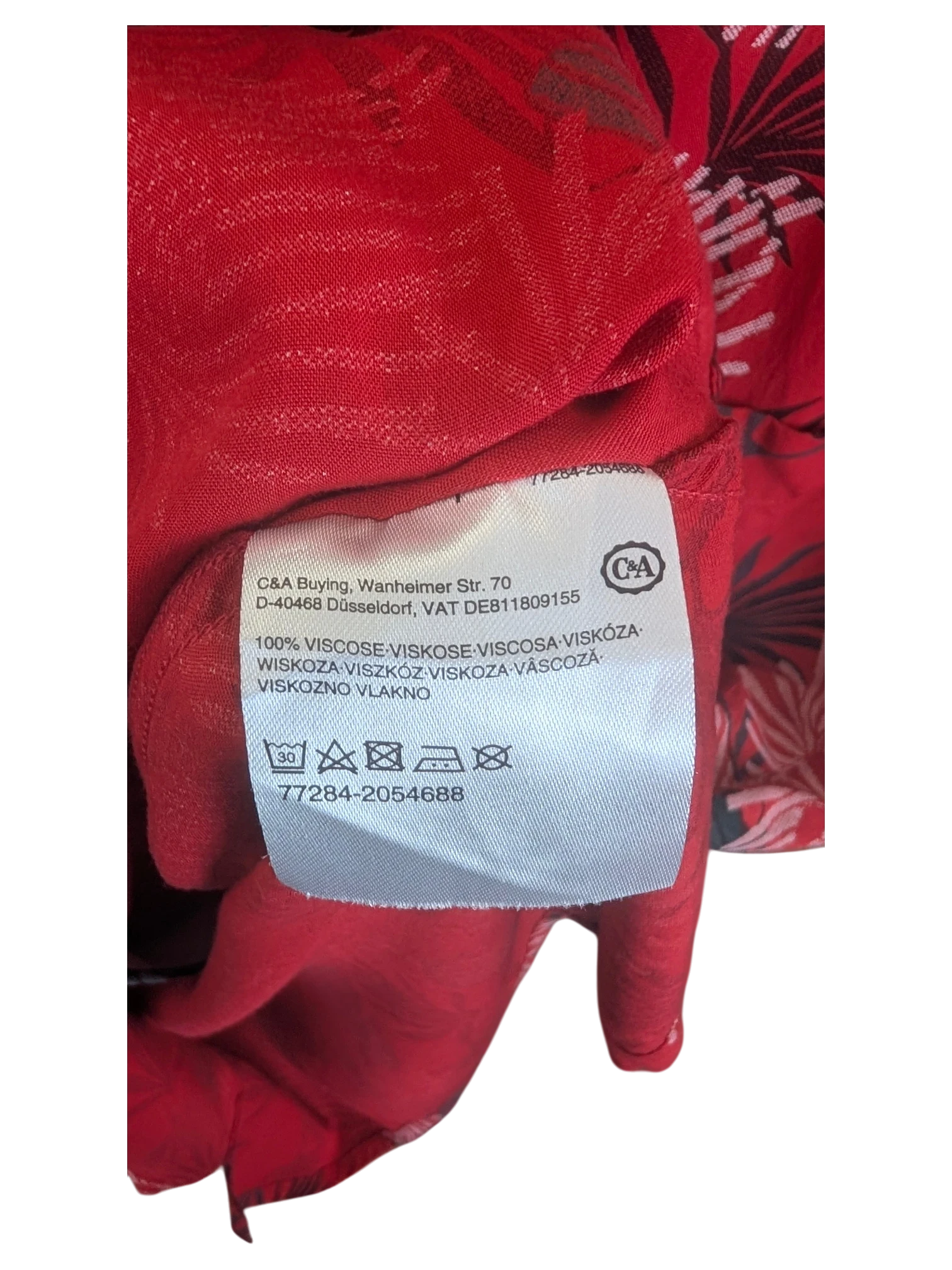 JAKE & IPI Angelo Litrico Hawaiian shirt care label showing 100% viscose material and washing instructions