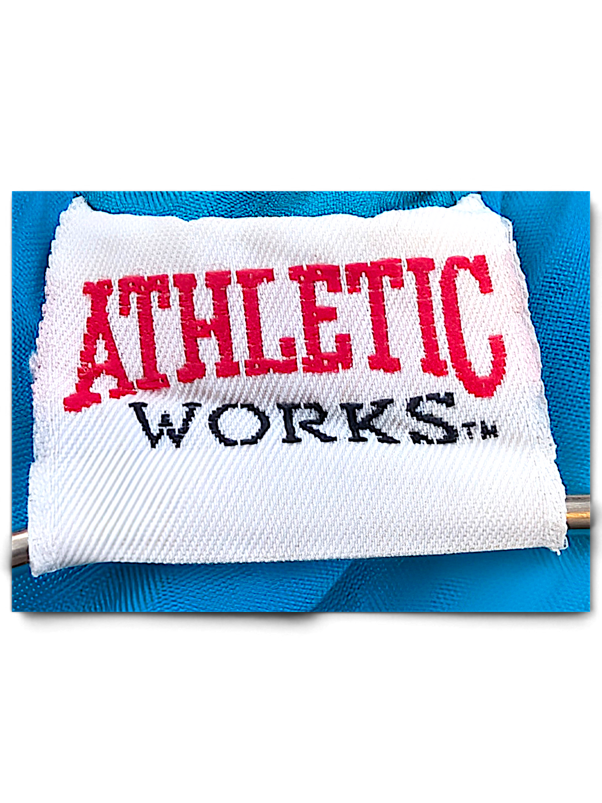 Athletic Works Purple and Teal Colourblock Windbreaker; Teal fabric and Athletic Works brand label.