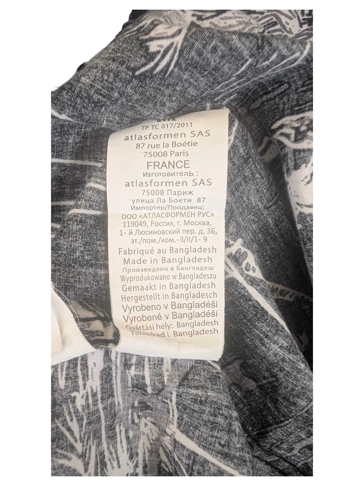 JAKE & IPI Atlas For Men Hawaiian shirt fabric care label with manufacturing details in multiple languages