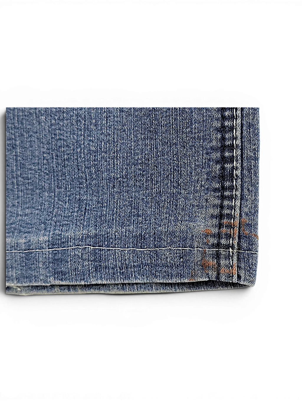 JAKE & IPI Baccini straight leg jeans in blue denim with visible hem stitching and light wash detail