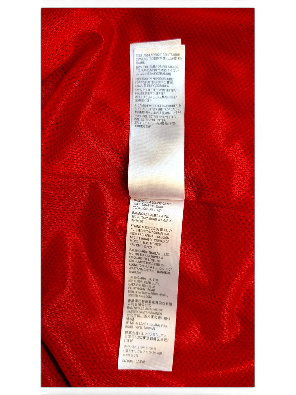JAKE & IPI Balenciaga x Adidas clothing care label with fabric composition and manufacturing details in red