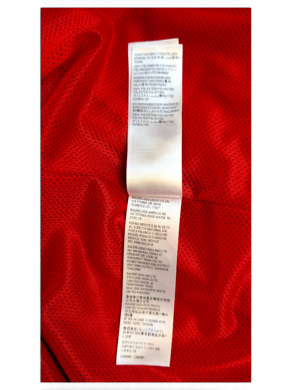 JAKE & IPI Balenciaga x Adidas garment care label showing fabric composition and manufacturing details in red
