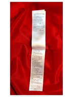 JAKE & IPI Balenciaga x Adidas garment care label showing fabric composition and manufacturing details in red