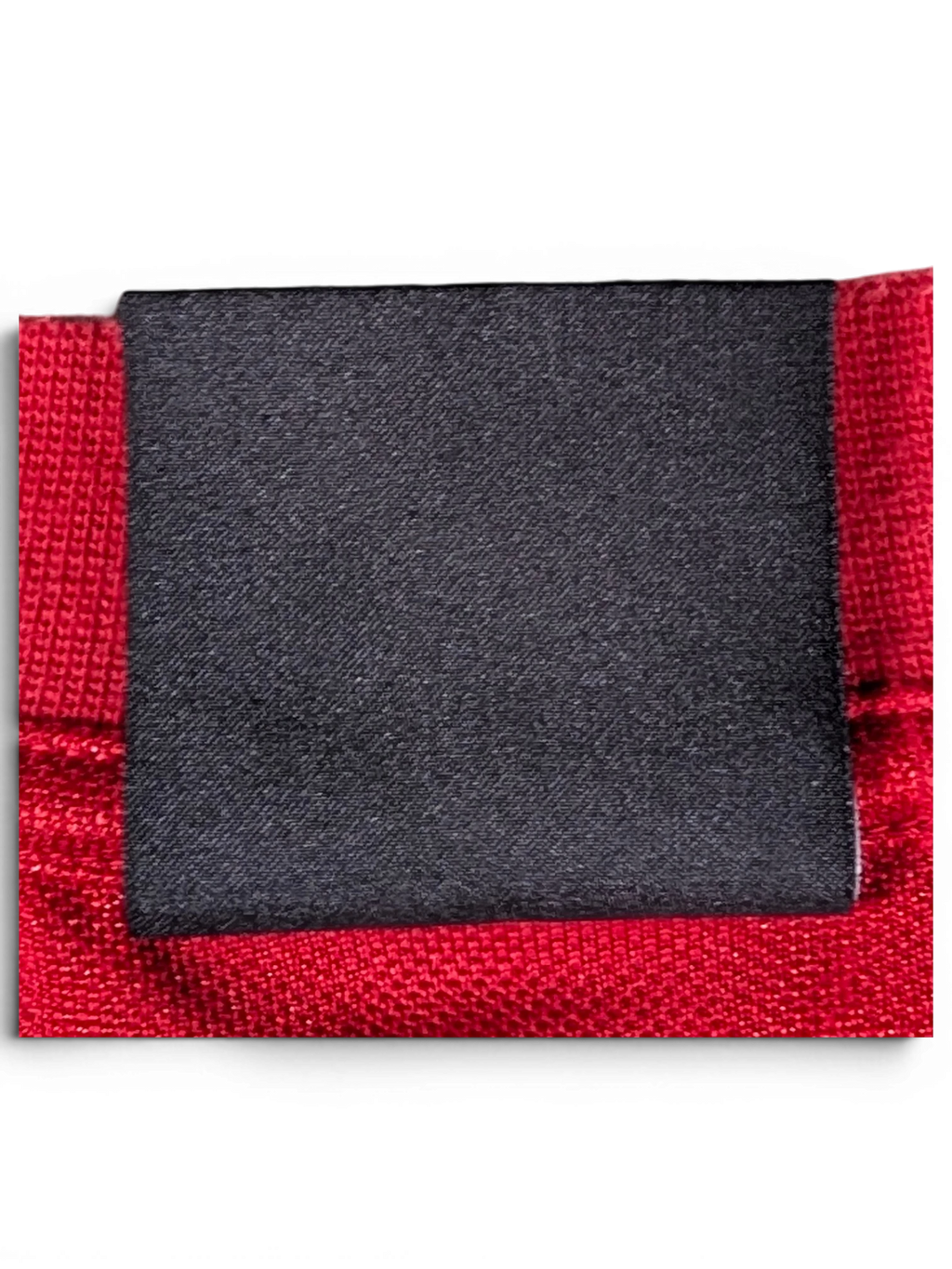 JAKE & IPI Balenciaga x Adidas jersey featuring a blank black fabric label on a textured red athletic material