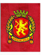 JAKE & IPI red Balenciaga x Adidas jersey featuring a detailed yellow and red embroidered lion crest logo.