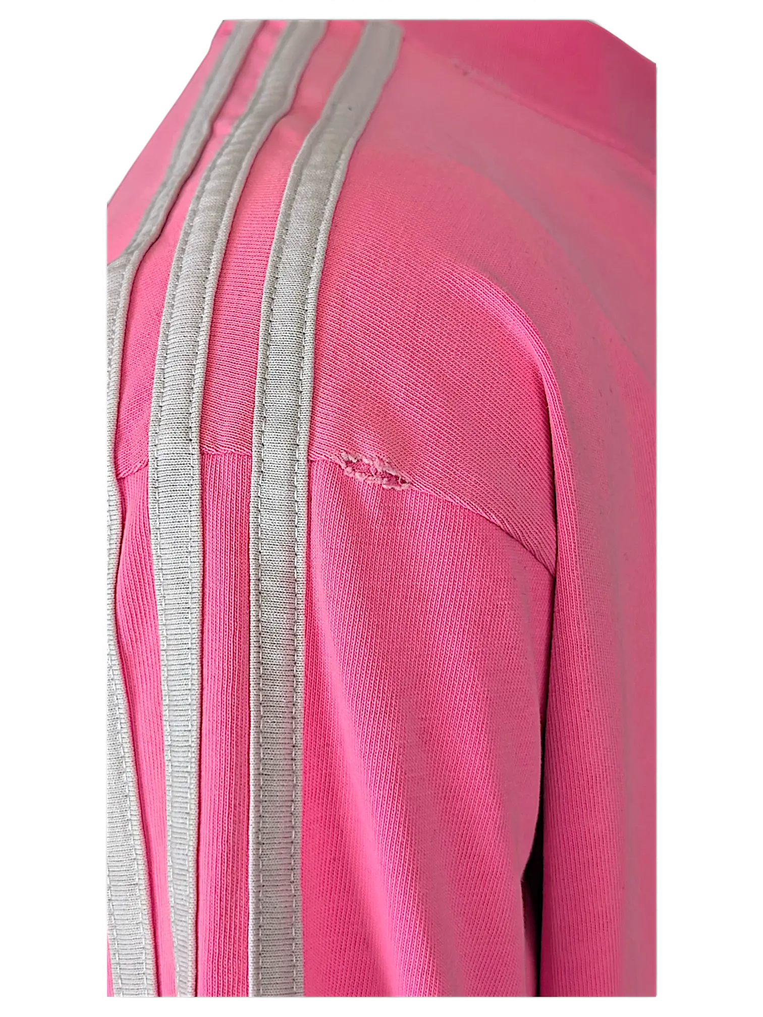 JAKE & IPI pink Balenciaga x Adidas T-shirt featuring signature grey three-stripe sleeve detail and fabric damage.