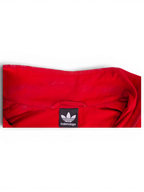 JAKE & IPI Balenciaga x Adidas red windbreaker jacket collar detail with branded logo tag