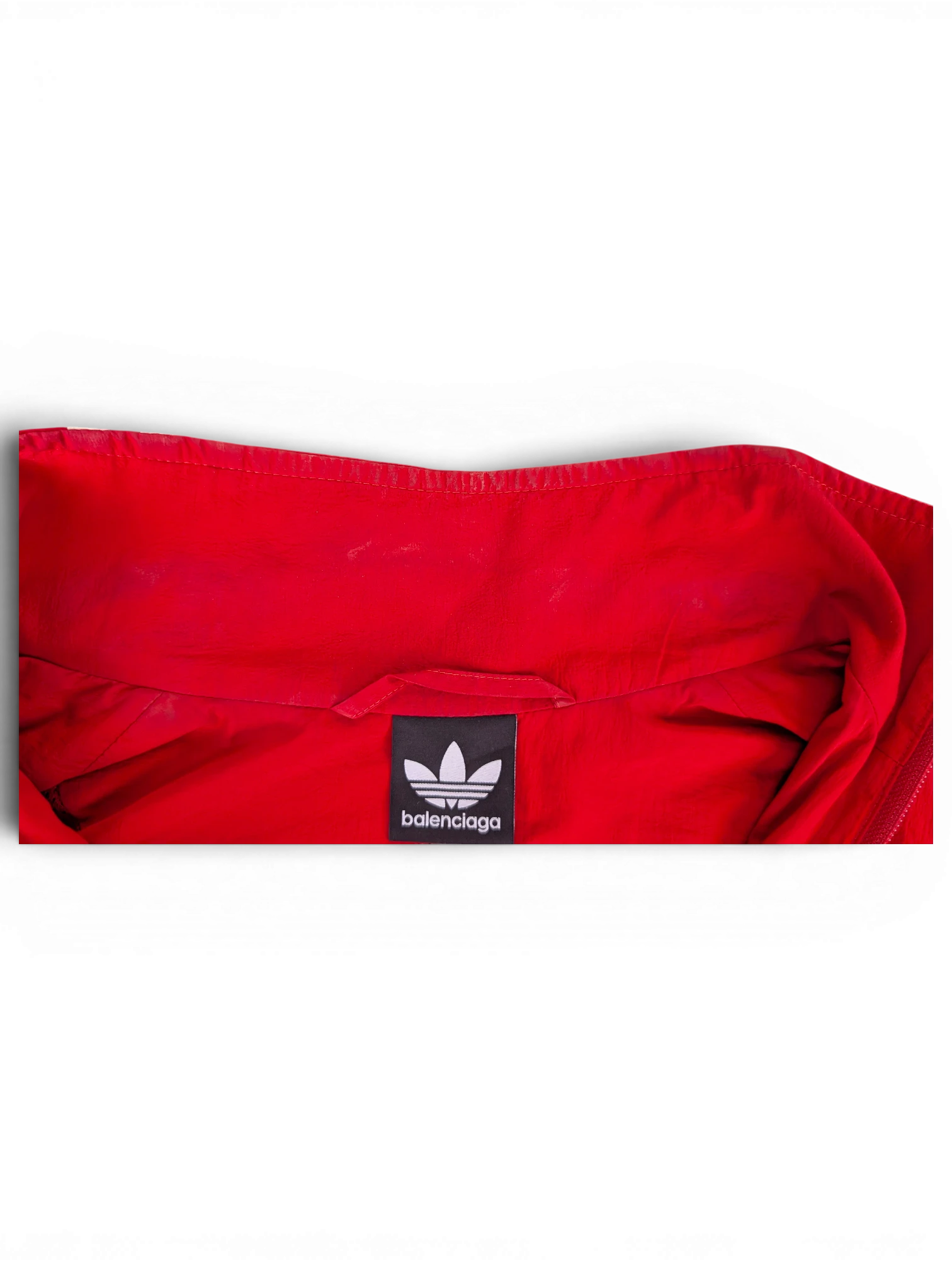 JAKE & IPI Balenciaga x Adidas red windbreaker jacket collar detail with branded logo tag