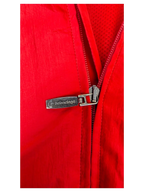 JAKE & IPI Balenciaga x Adidas red nylon jacket featuring a branded silver metal zipper pull