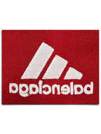 JAKE & IPI Balenciaga x Adidas red jersey featuring white embroidered logo detail